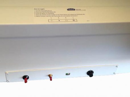 Freezer ignition control panel and thermostat adjustment knob
