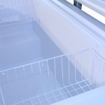 Freezer interior bottom with baskets