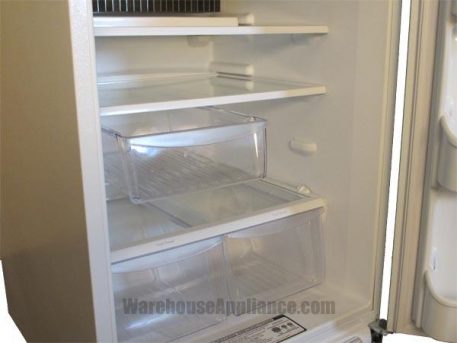 Glass shelves and deli drawer on this huge natural gas fridge