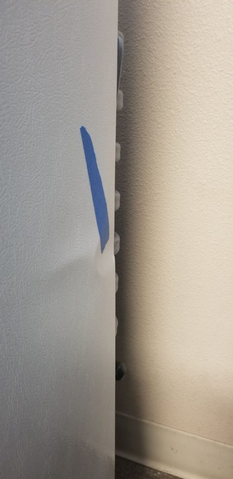 dent on right side of propane freezer